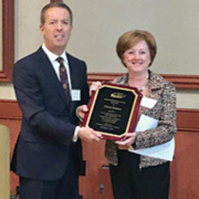 Diane Somers receiving ASAH President's Award from ASAH President Dr. Steve Morse